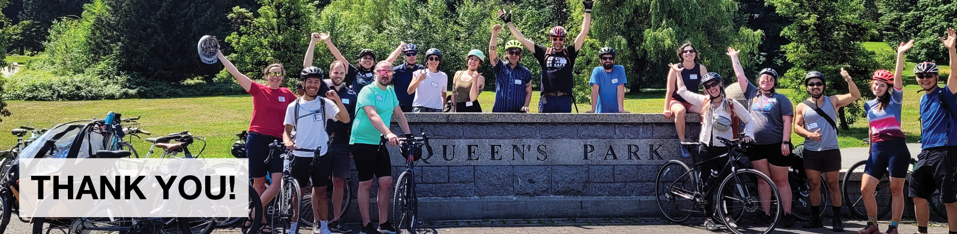 Thank You! A group photo of all of HUB Cycling's staff members in front of Queen's Park.