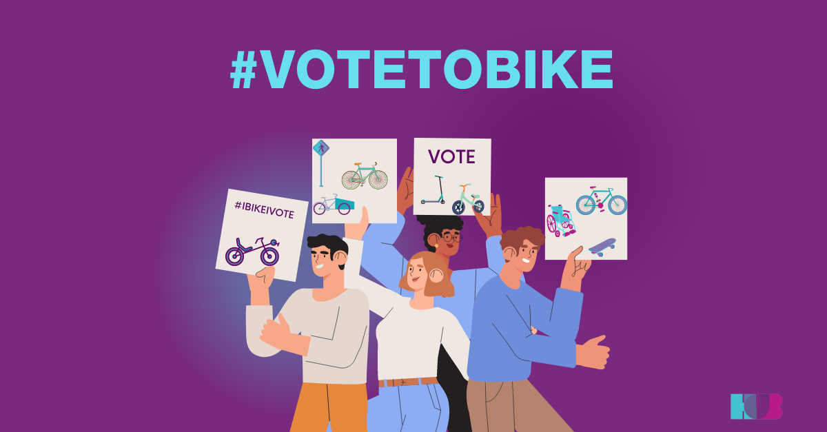 An illustration of several people holding up voting signs. Text on the image reads: "VoteToBike".